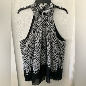 Halter style, black and white top.